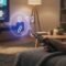 Fire TV Stick connected to a smart TV with a cozy living-room setup and abstract VPN and streaming icons, no text